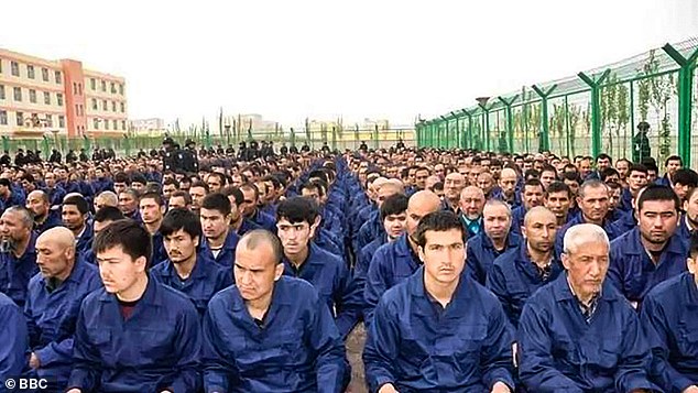 Detainees listen to sermons at a camp in Lop County, Xinjiang, China - China's Muslim-majority northwest province.  China has been accused of leading a genocide in the region due to cultural and religious differences