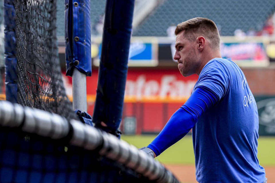 Los Angeles Dodgers first team Freddy Freeman (5) waits during batting practice before a baseball game against the Atlanta Braves, Friday, June 24, 2022 in Atlanta.  (AP Photo/Butch Dale)