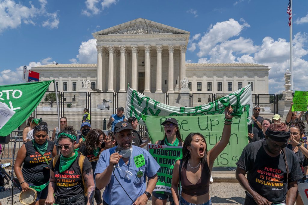 Demonstrators for abortion rights demonstrate in front of the Supreme Court on June 25.