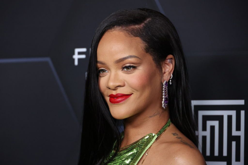 Rihanna poses for a photo as she celebrates her beauty brands 50 Beauty and 50 Skin at Joya Studios on February 11, 2022 in Los Angeles, California.