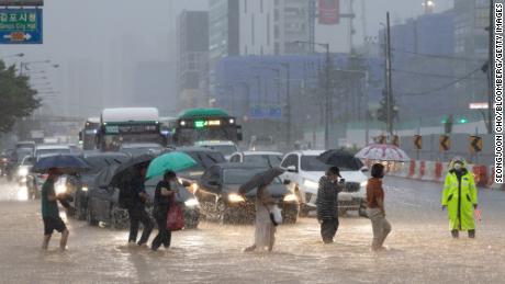 Record rain killed at least 9 people in Seoul as water submerged buildings and inundated cars