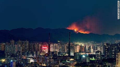 Forest fires erupt as the Chinese city of Chongqing suffers a relentless record heat wave