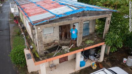 Getsabel Osorio stands in her home that was destroyed by Hurricane Maria five years ago before Fiona arrived in Luisa, Puerto Rico.