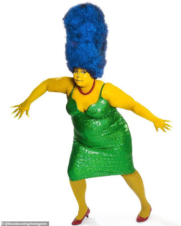 cheerful!  Her skin was painted a light yellow, and she wore a light green sequin dress to complete her look