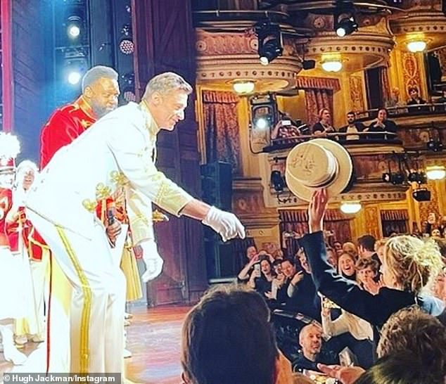 Nicole Kidman surprised audiences Saturday when she attended Hugh Jackman's Broadway musical The Music Man for good reason.  The Hollywood actress, 55, stunned onlookers when she offered a staggering $150,000 (US$100,000) for a signed hat worn by Hugh in the show, with proceeds from the auction going to Broadway Cares.  Both are in the photo