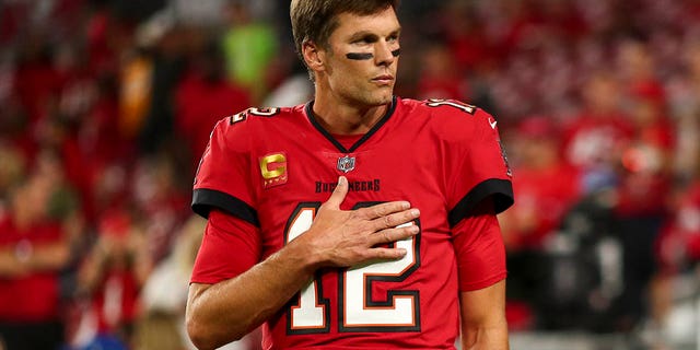 Tom Brady #12 of the Tampa Bay Buccaneers stretches before an NFL football game against the New Orleans Saints at Raymond James Stadium on December 5, 2022, in Tampa, Florida.